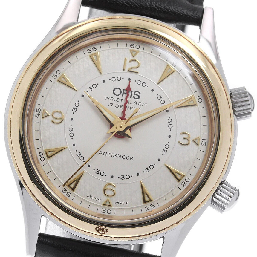 Mechanické hodinky Oris s budíkem z roku 1988.